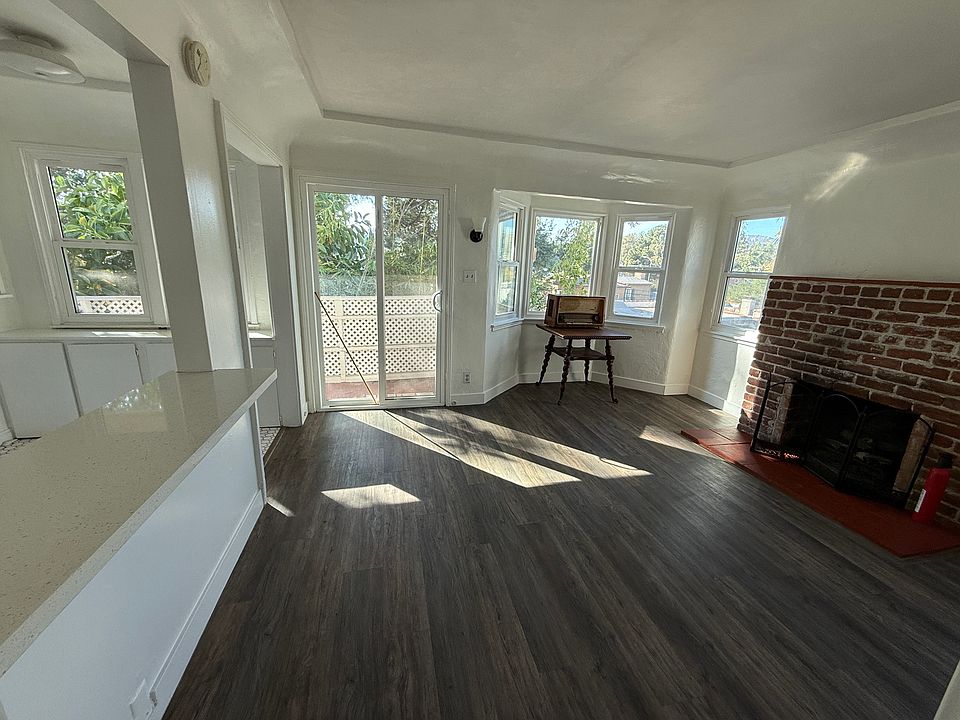 Living Area with gas fireplace and lots of natural light.
