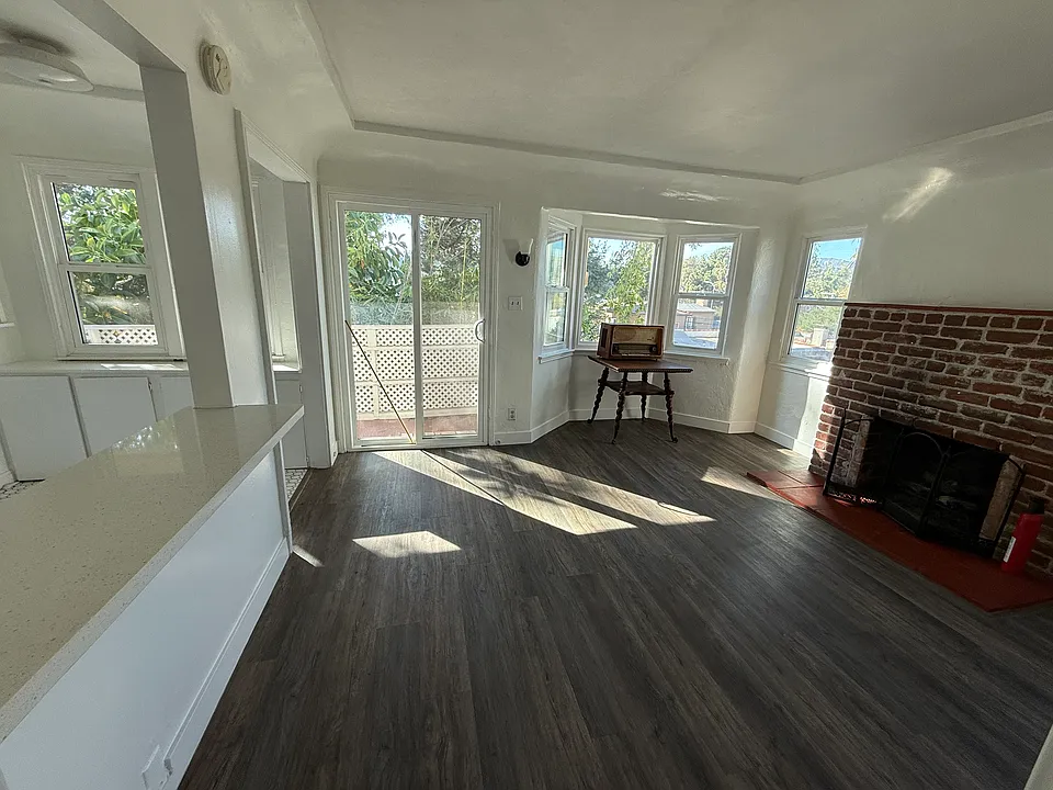 Living Area with gas fireplace and lots of natural light.
