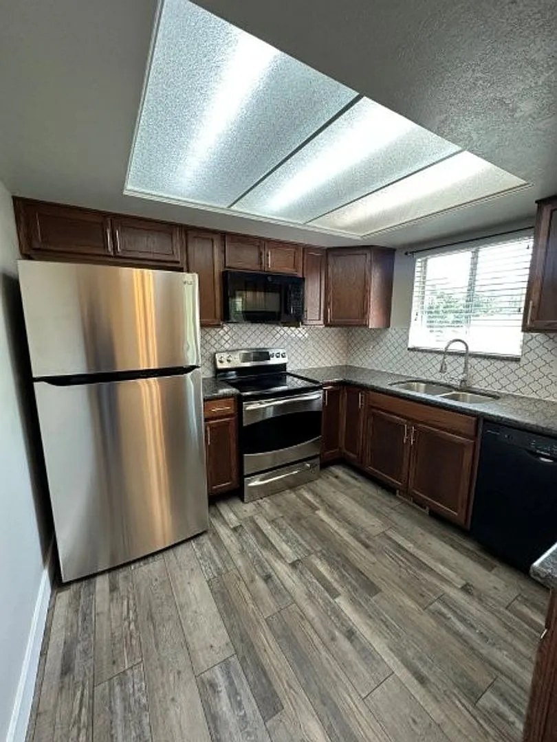 Light Up Your Summer 2 Weeks Rent Free! | Spacious 3 Bed, 2 Bath Home with RV Parking & Outdoor S... — Photo 2
