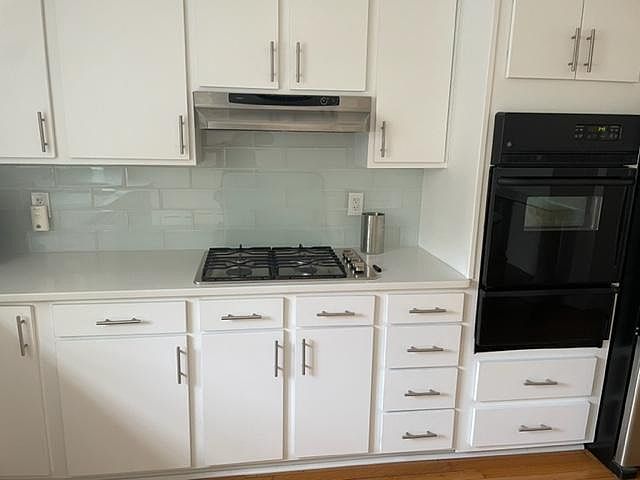 Eye level oven, with new stainless steel cooktop.