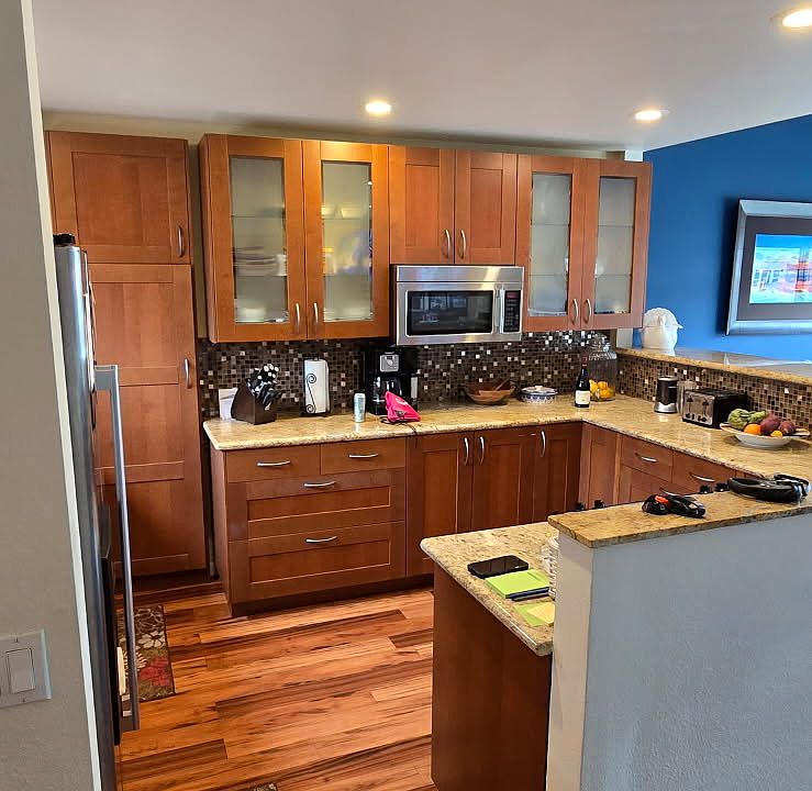 Open kitchen to the living room, with view of lagoon.