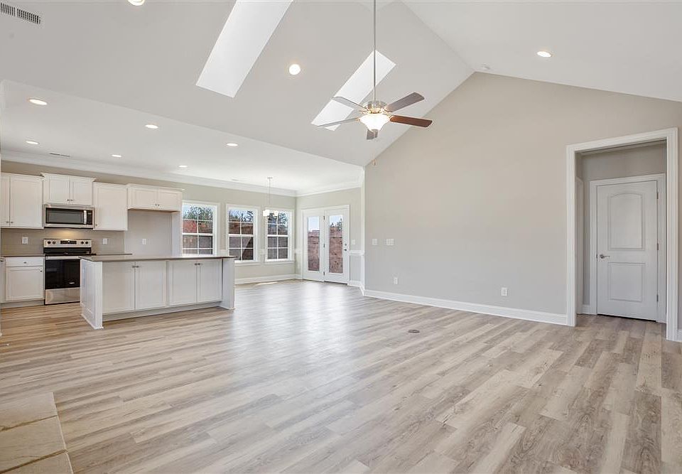 Family room with vaulted ceiling