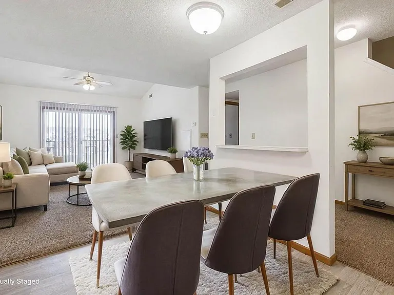 Open living and dining areas bring everyday routines together with space to gather, connect, and unwind.