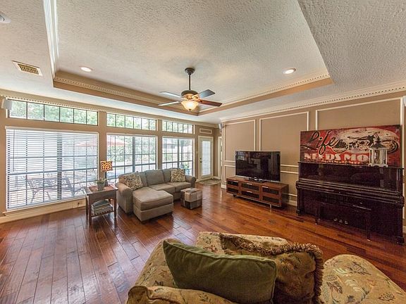 A Room with a View! Overlooking the pool and backyard oasis.