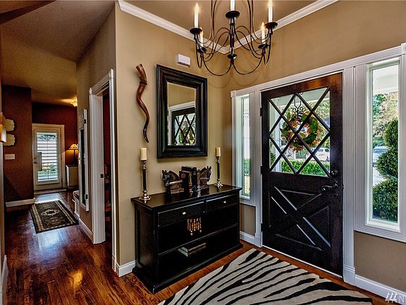 Upon entering the home you can go to your right into the kitchen/dining area, or straight ahead into the living room. Included in the amenities is central vacuum system on all three floors. The heating is forced-air with a heat pump, so there is AC when needed.