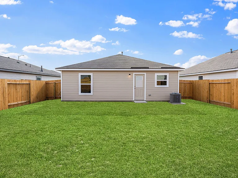 A private, fully fenced backyard.