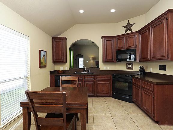 Large open kitchen with recent upgrades including new recycled composite granite sink and faucet alo