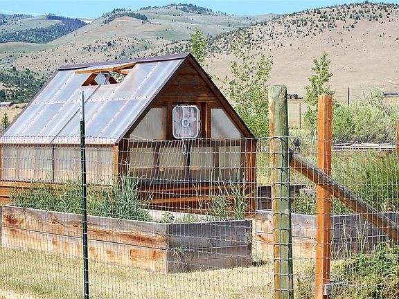 Fenced Greenhouse & Garden