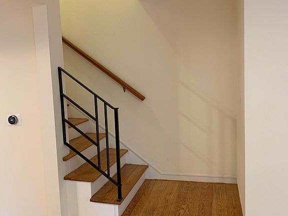 Stairs to bedrooms and bathroom