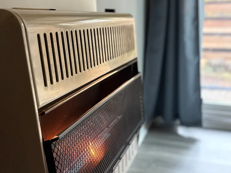 Propane heater is centrally located and heats the entire home with ease.