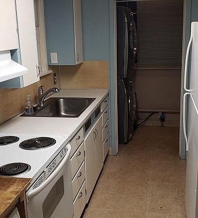 Kitchen plus laundry room