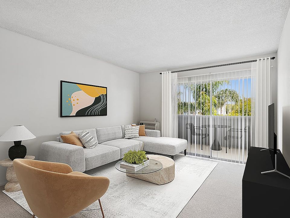 Renovated Package II living room with carpet (select homes)