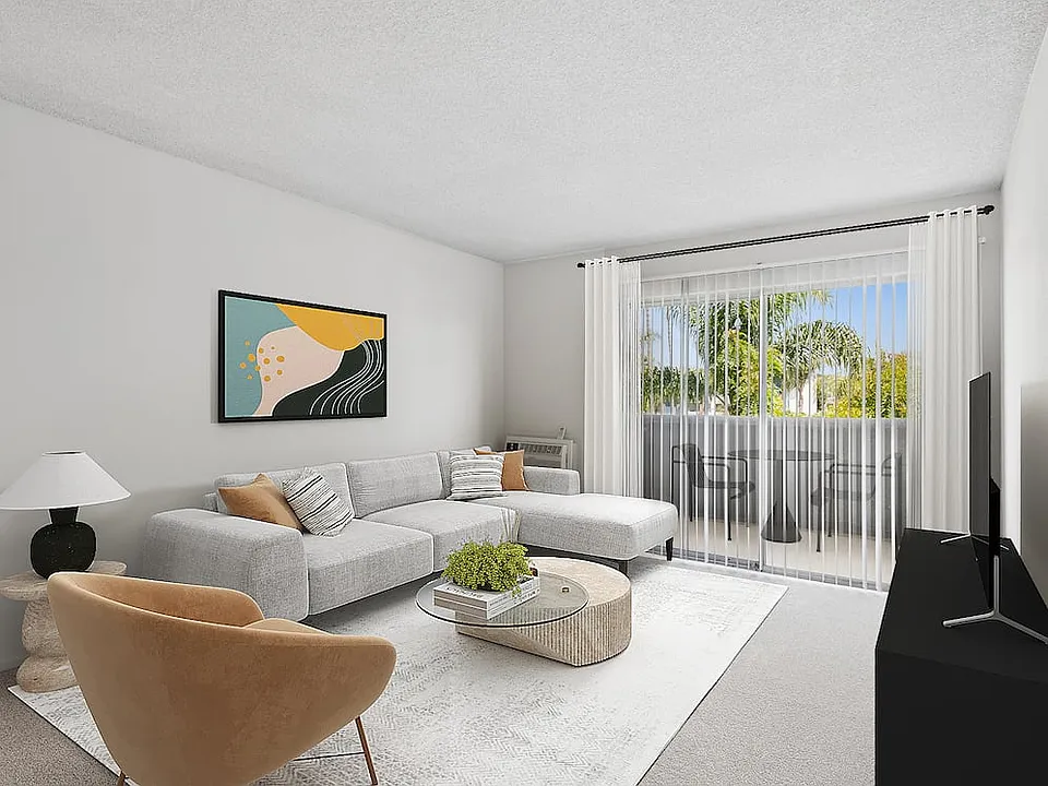 Renovated Package II living room with carpet (select homes)