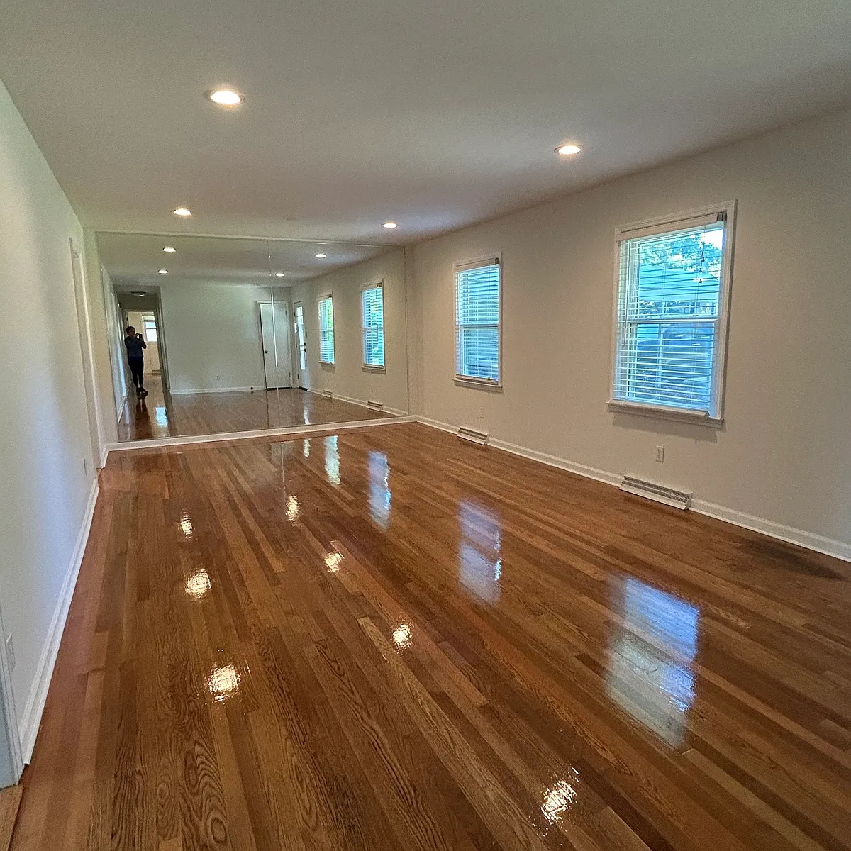 Very large living room with newly refinished hardwood flooring - 533 Grantchester St