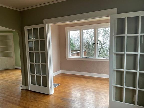 Sun room/alcove with a peek into the dining room