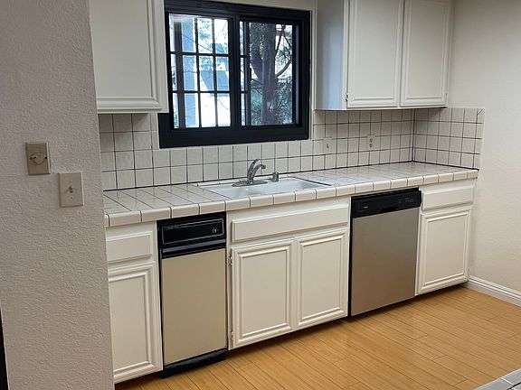 Large open kitchen with new stainless steel appliances