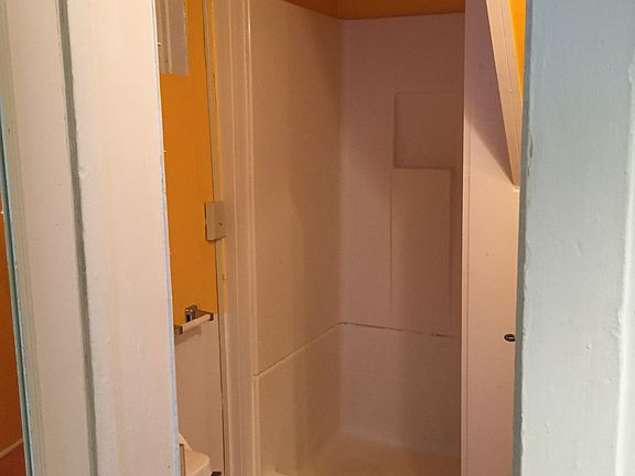 Full Bathroom with shower and updated vanity and mirror.