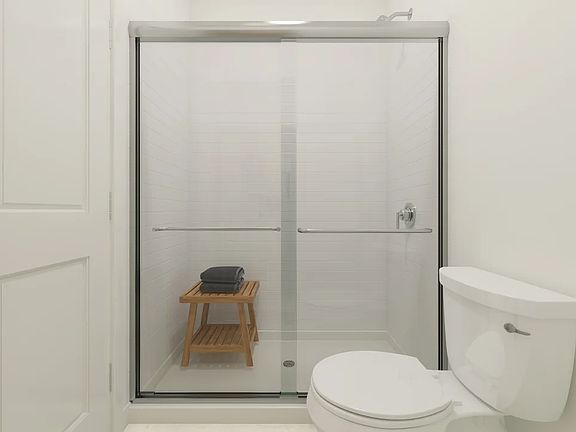 Primary bath with glass shower enclosure