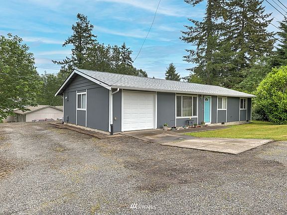 Fresh exterior paint, newer garage door and tons of parking. 
