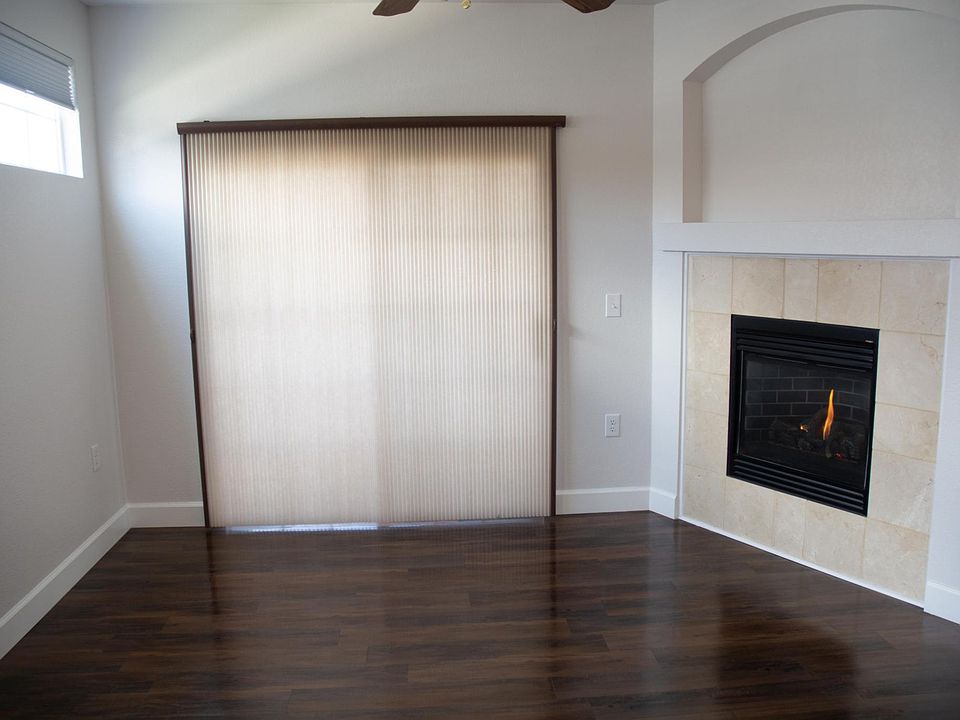 Living Room with with Gas fireplace. Vinyl Plank flooring