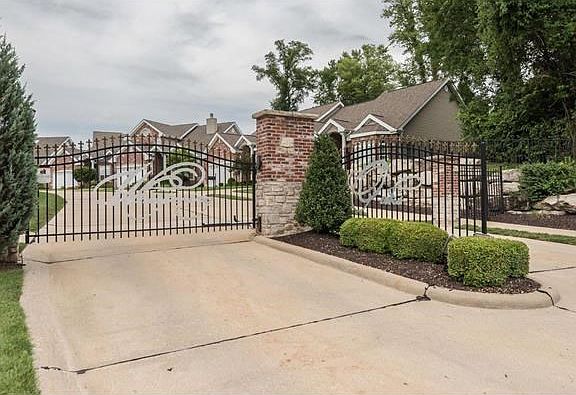 The Grand gated Brick and Stone Entry of Whispering Oaks adds an elegant touch while offering another element of security and privacy.  The  community is graced with a perimeter of tall mature trees.