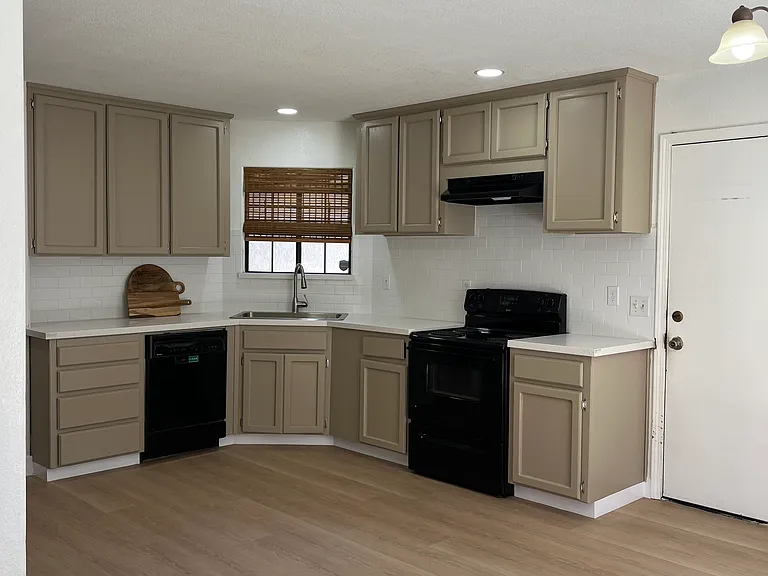 Brand new quartz counters with new white subway tile.