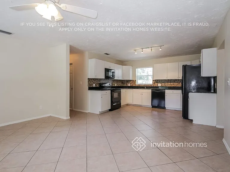 923 38th St W — Photo 3