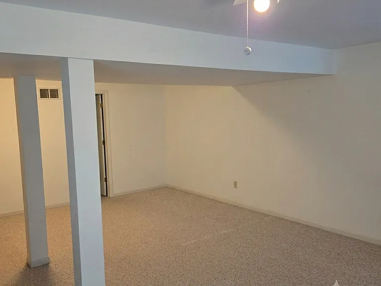 Finished walkout basement with large storage room