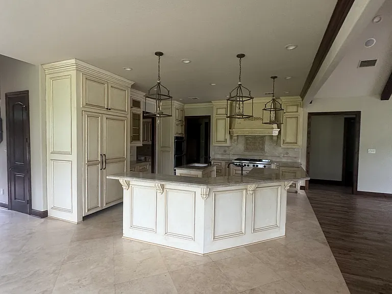 Open concept kitchen, breakfast area and family room