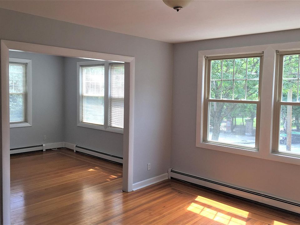 Light-filled dining and living rooms with view of park.