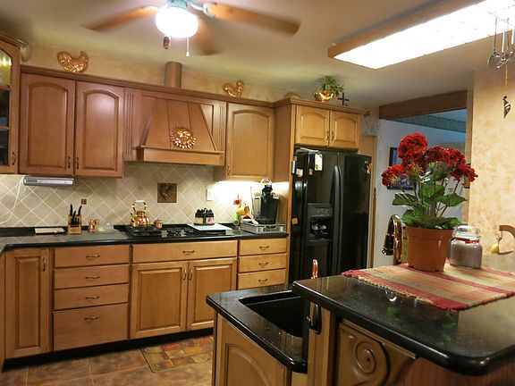 Renovated kitchen with maple cabinets