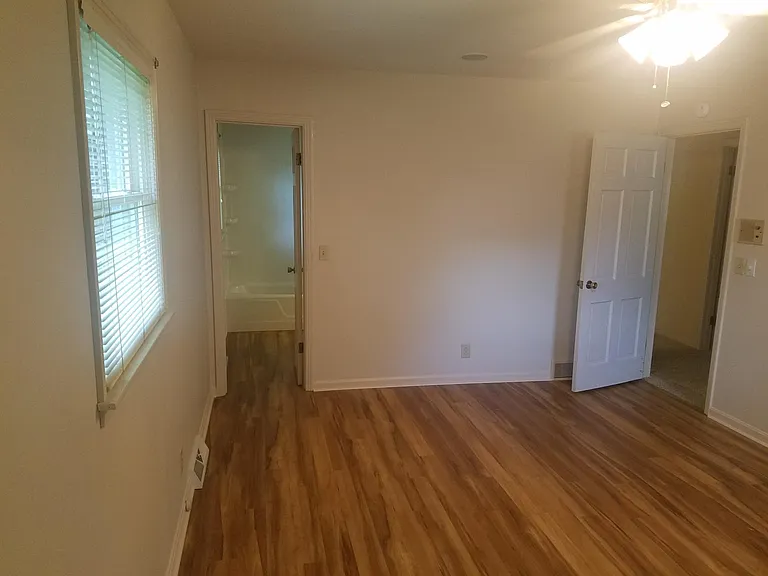 Large master with new flooring and direct access to remodele