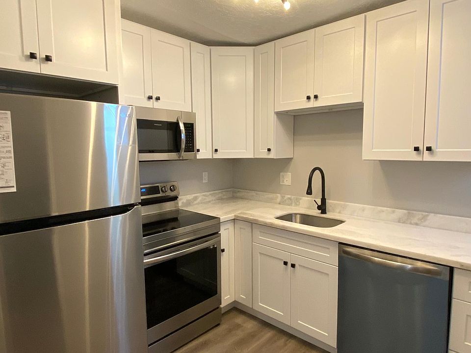 Brand new kitchen with quartz countertops, new cabinets, flooring, lighting, electrical, and new appliances