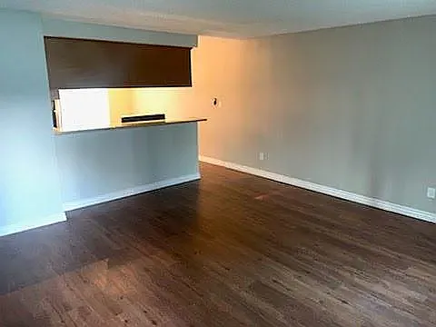 PREVIOUSLY REMODELED (BROWN VYNL FLOORING)