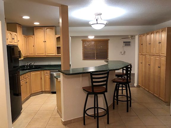 Lots of cabinets in kitchen area