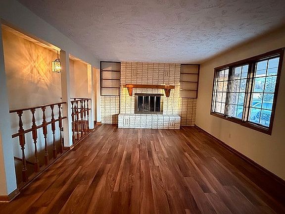 Front room w/wood Fireplace