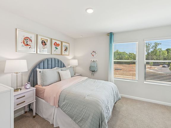 Secondary bedroom in the Jade floorplan at a Meritage Homes community in Mebane, NC.