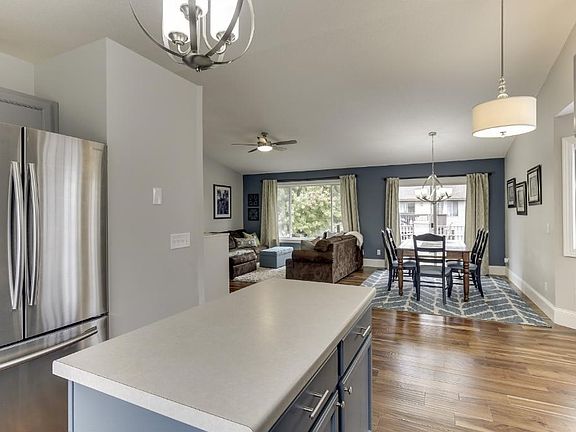 Gourmet kitchen with custom cabinets and newer appliances