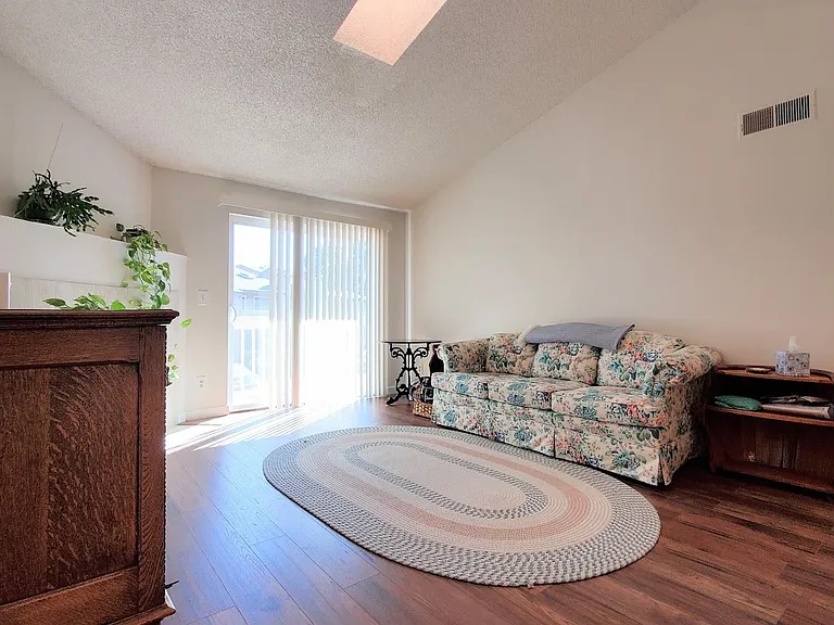 Large living area (12' 9" by 17') with access to the large deck