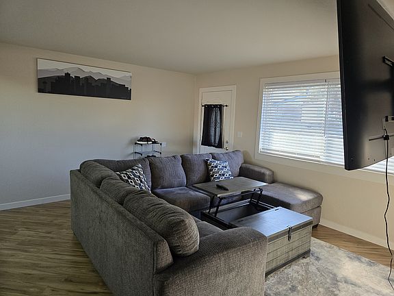 Upstairs Living room with 75-Inch Smart TV.