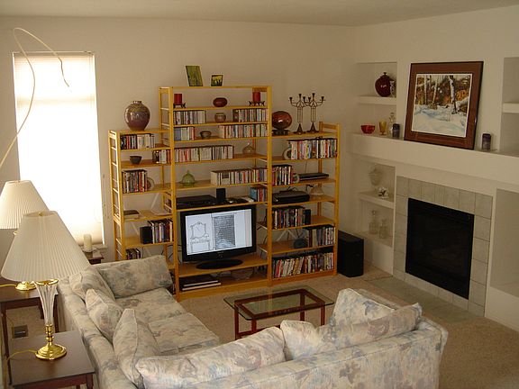 Comfortable and cozy Family room off the open kitchen area. Warming fireplace.
