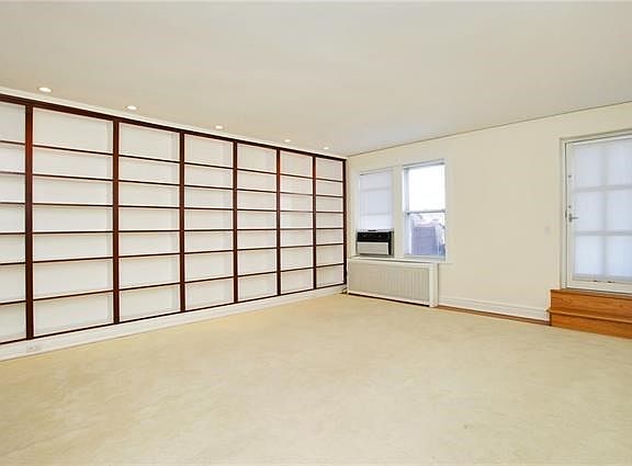 Living Room with built-ins offers a wonderful place to display books, artwork, photos etc.