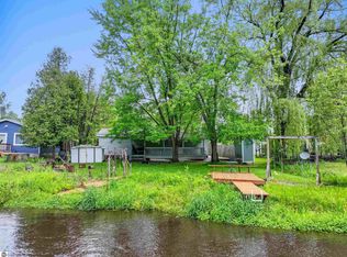 10793 Riverside Dr, Honor, MI 49640