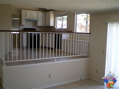 view looking at the kitchen form the family room