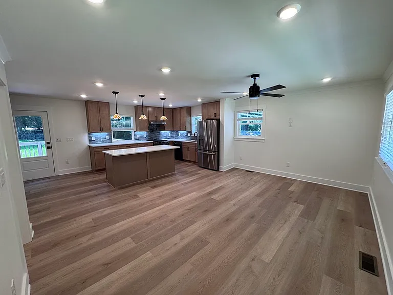 View of family room and kitchen when you walk in home