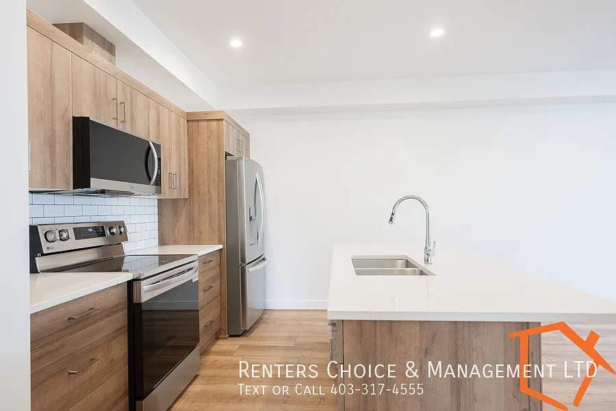 New 2 Bedroom Lower Level Suite With Assigned Parking — Photo 3