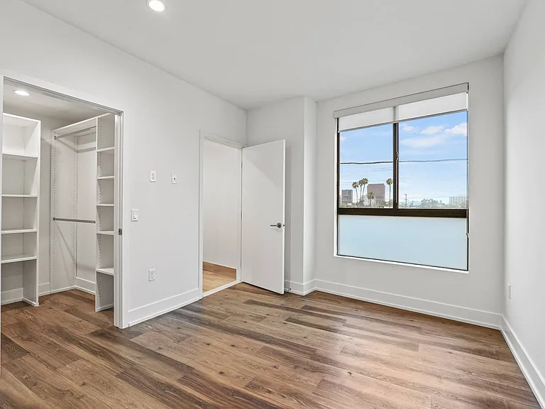 Bedroom with Bathroom and Walk-In Closet with Built-In Organizers