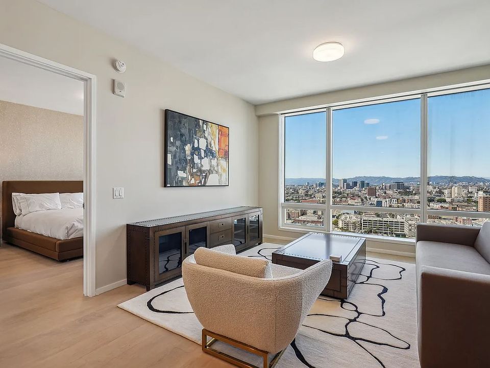 High ceilings along with floor-to-ceiling windows.