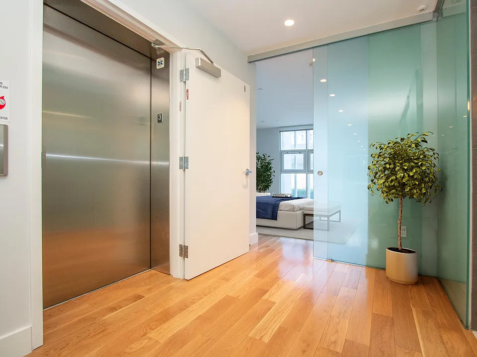 elevator opens directly into this full floor flat!