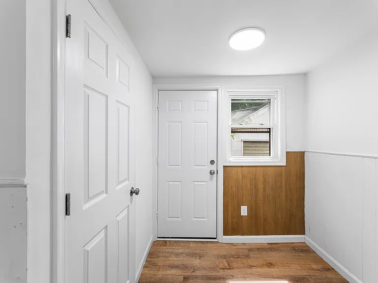 Rear entry/exit to garage.